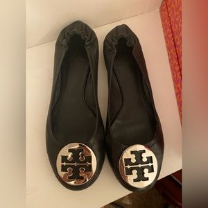 Authentic Tory Burch flats in black with silver emblem. Size 9